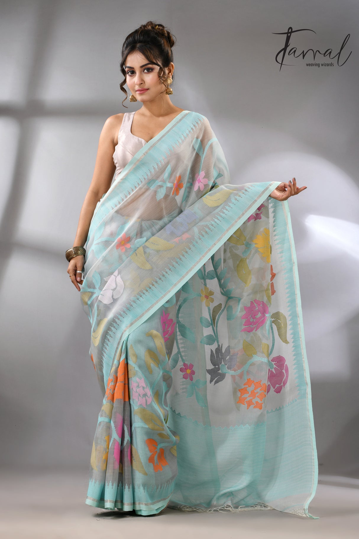 Firoza with light smoke gray and multi colour allover floral handwoven muslin silk jamdani saree