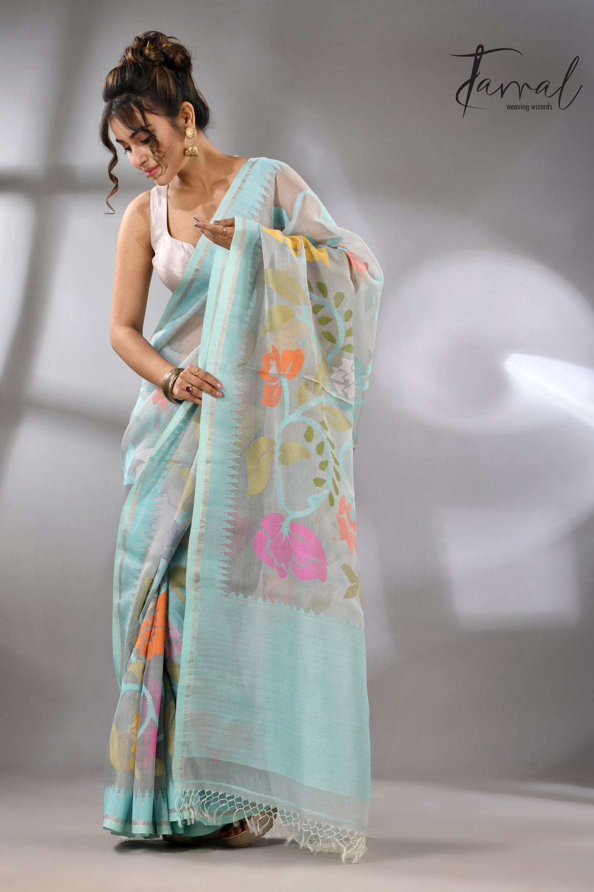 Firoza with light smoke gray and multi colour allover floral handwoven muslin silk jamdani saree