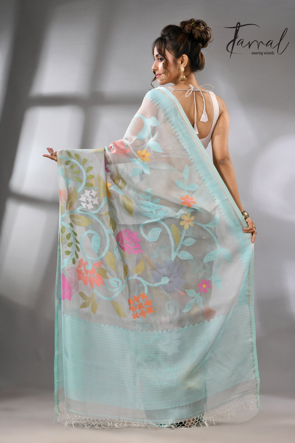 Firoza with light smoke gray and multi colour allover floral handwoven muslin silk jamdani saree