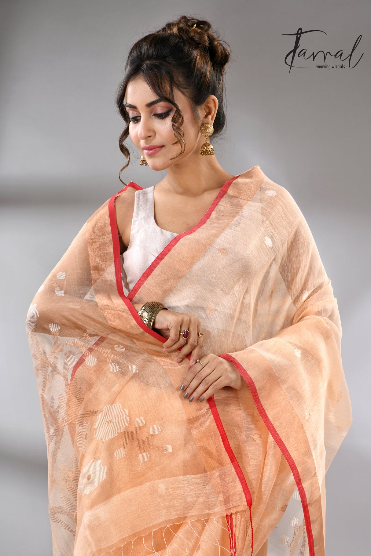 Light peach with red & zari border silk linen handwoven jamdani saree