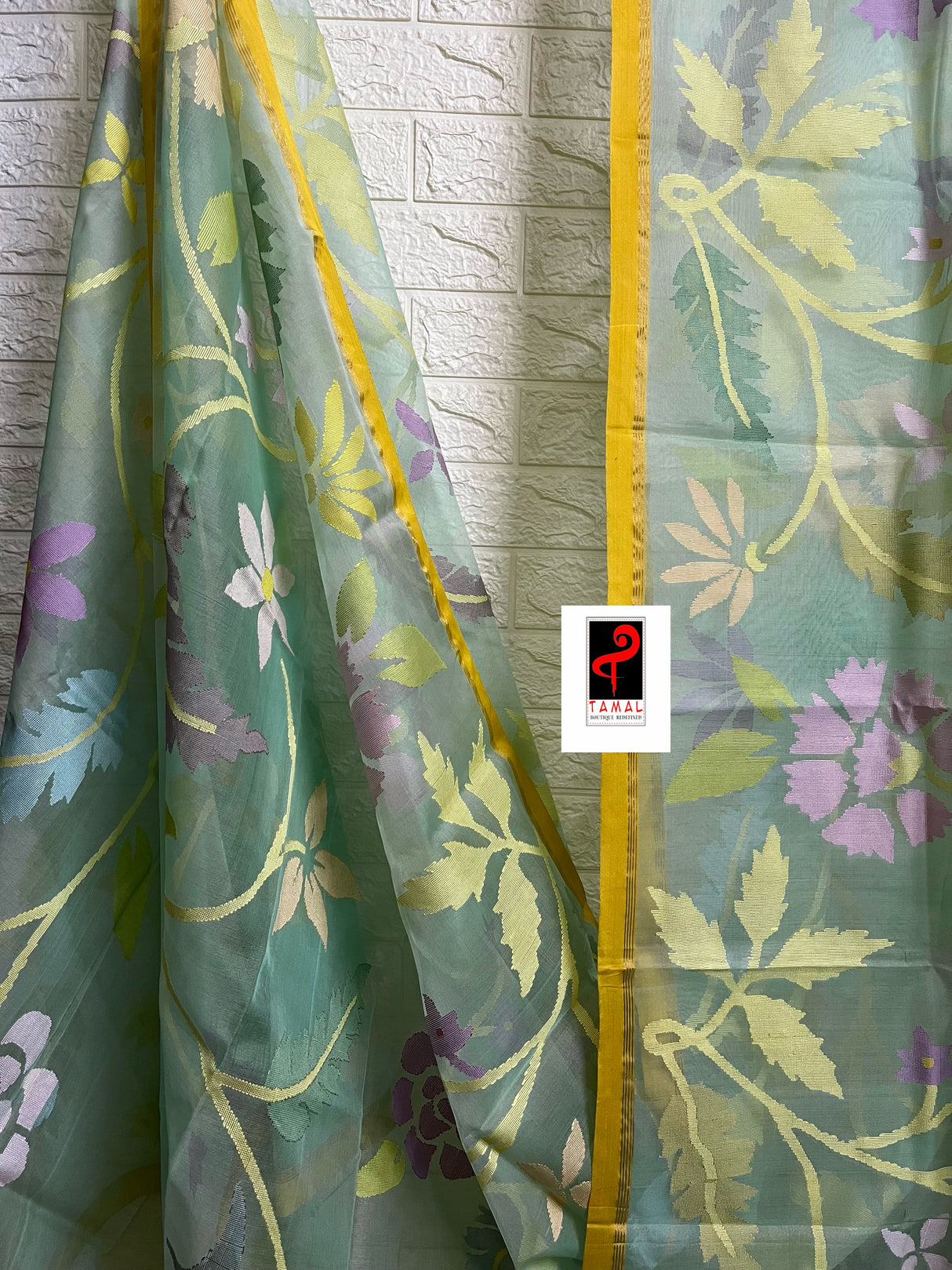 Sea green with multi colour & yellow border allover floral handwoven jamadani saree in muslin silk