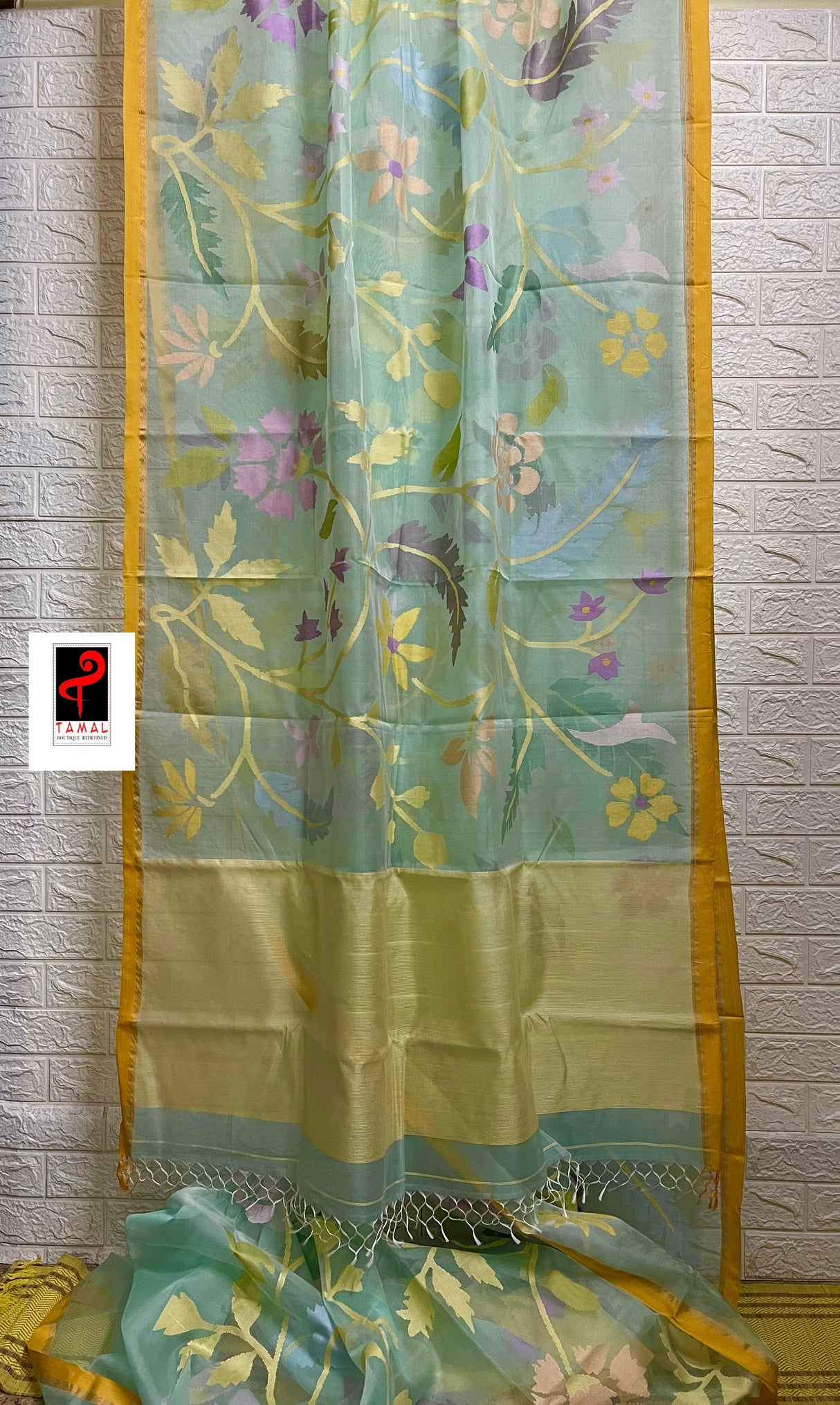 Sea green with multi colour & yellow border allover floral handwoven jamadani saree in muslin silk