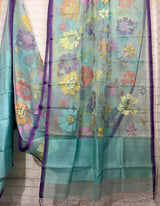 Turquoise blue with allover seasonal floral motifs handwoven muslin silk jamdani saree