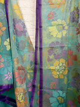 Turquoise blue with allover seasonal floral motifs handwoven muslin silk jamdani saree