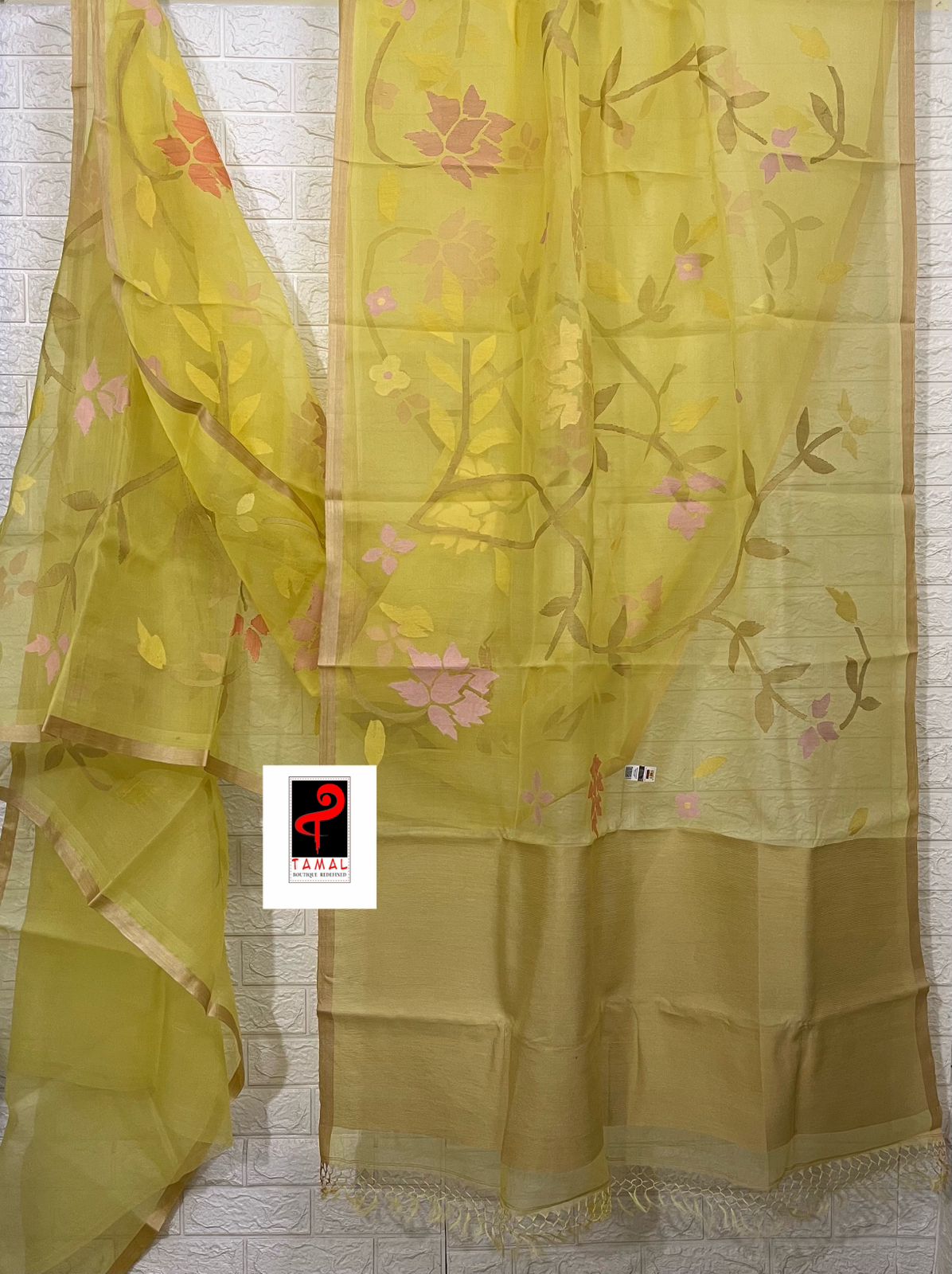 Yellow with tusser border allover floral handwoven jamdani saree in muslin silk