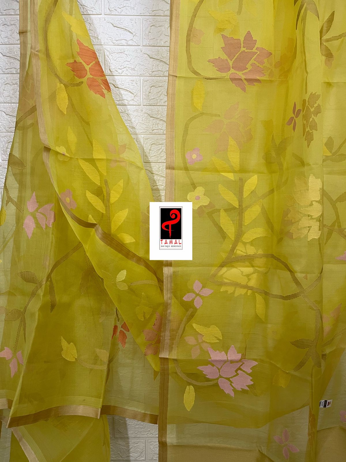 Yellow with tusser border allover floral handwoven jamdani saree in muslin silk