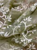 Light mint green with white allover floral handwoven jamdani in muslin silk saree