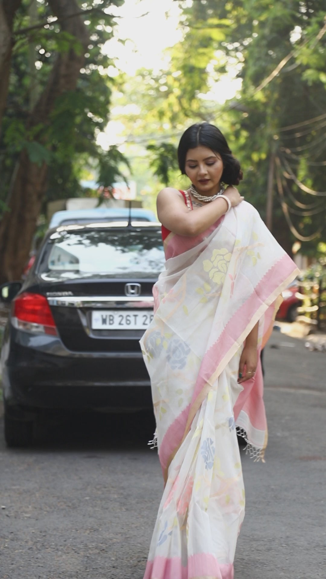 White with Pink border multicolour all over rose motifs muslin silk handwoven jamdani saree