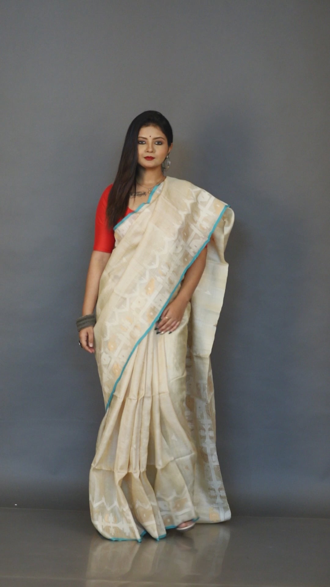 Beige with firoza border traditional handwoven jamdani saree in tusser silk