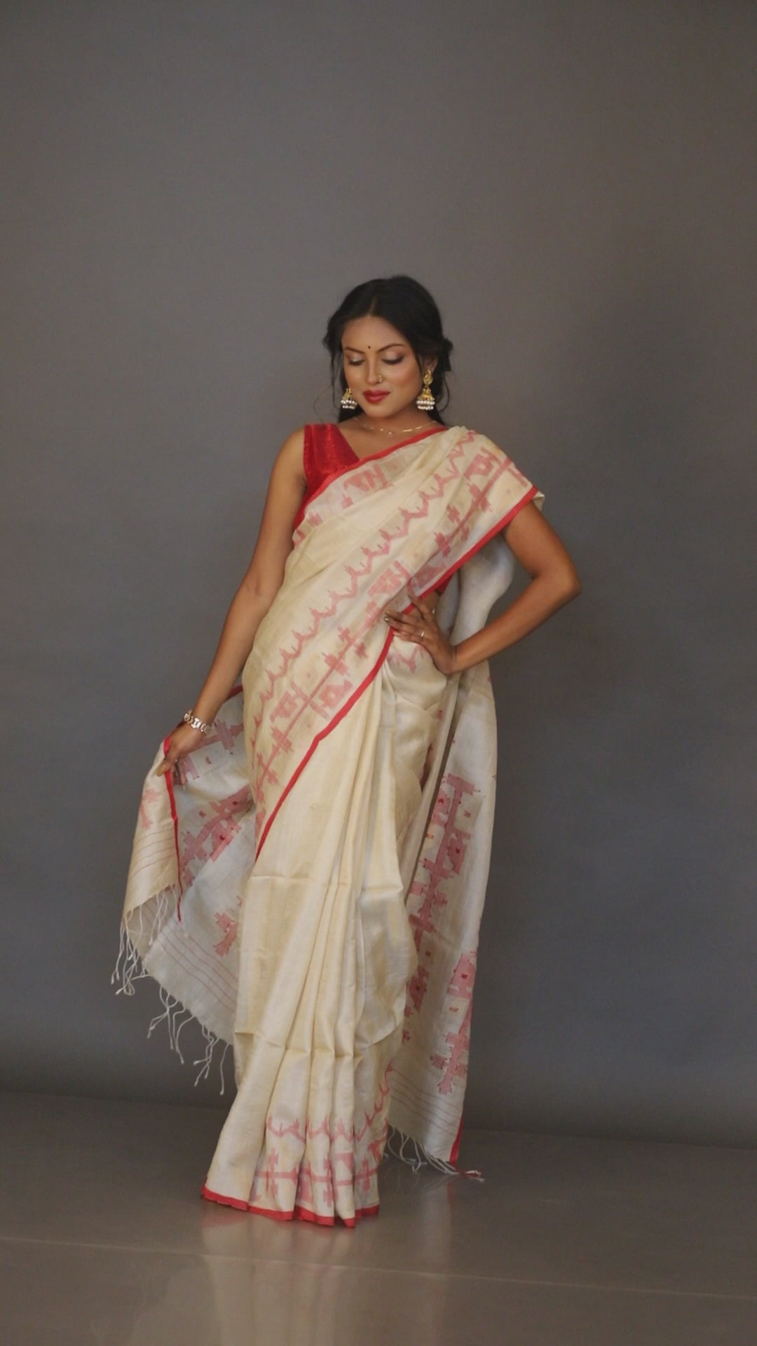 Light beige with red colour traditional tussar silk handwoven dhakai jamdani saree