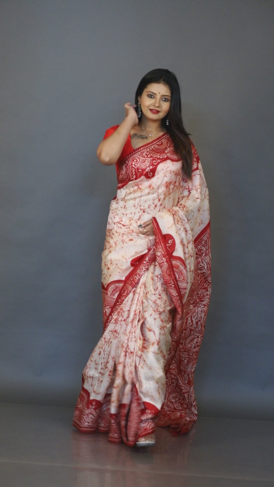 Offwhite red alpona motifs handcrafted crack batik silk saree